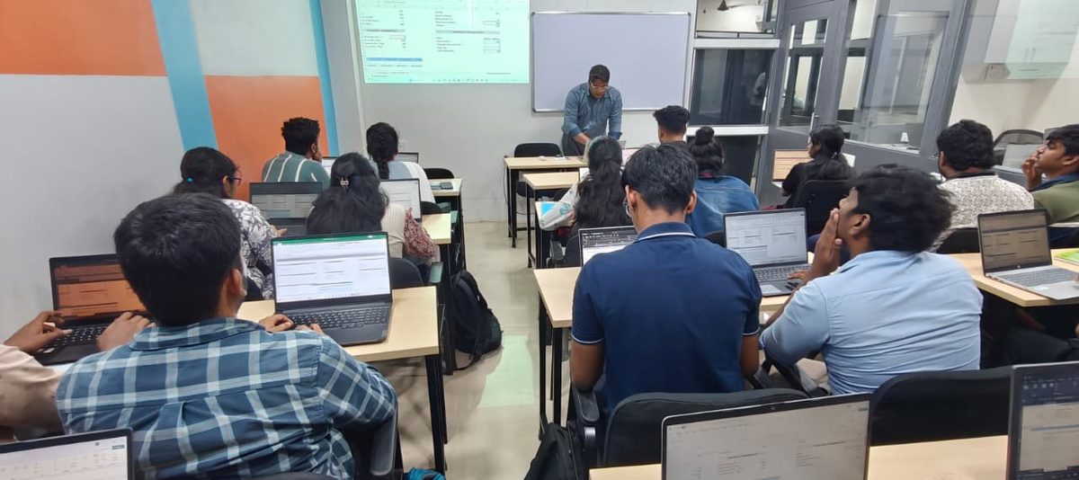 Students building Excel models in a SkilledGrad Financial Modelling & Valuation class